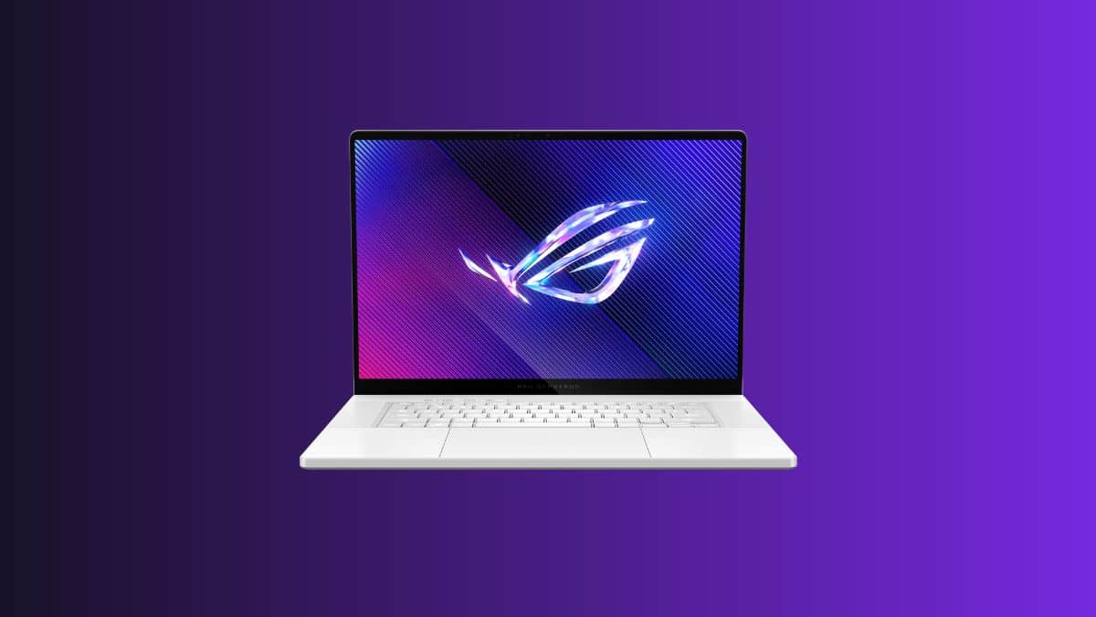 ASUS laptop on purple gradient background